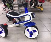 Детский трехколесный велосипед с амортизатором